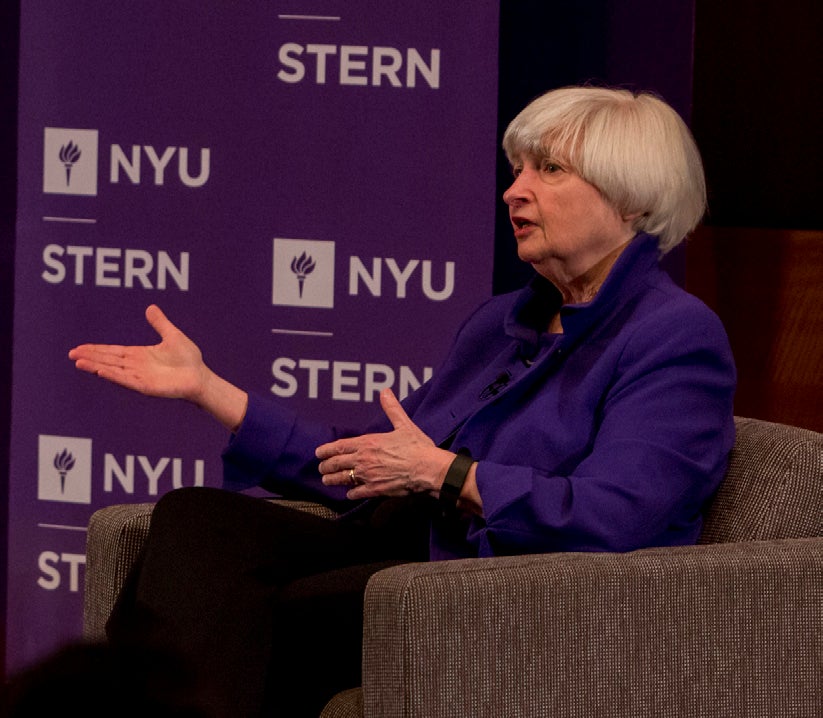 Photo of Janet Yellen in Conversation with Lord Mervyn King, explaining an answer to the audience