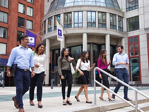 Members of the Stern community walking on Gould Plaza at Stern