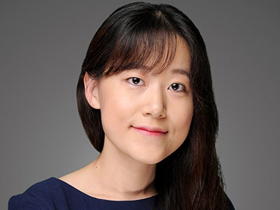 A headshot shows MBA student Su-Kyong Park in front of a gray backdrop. 