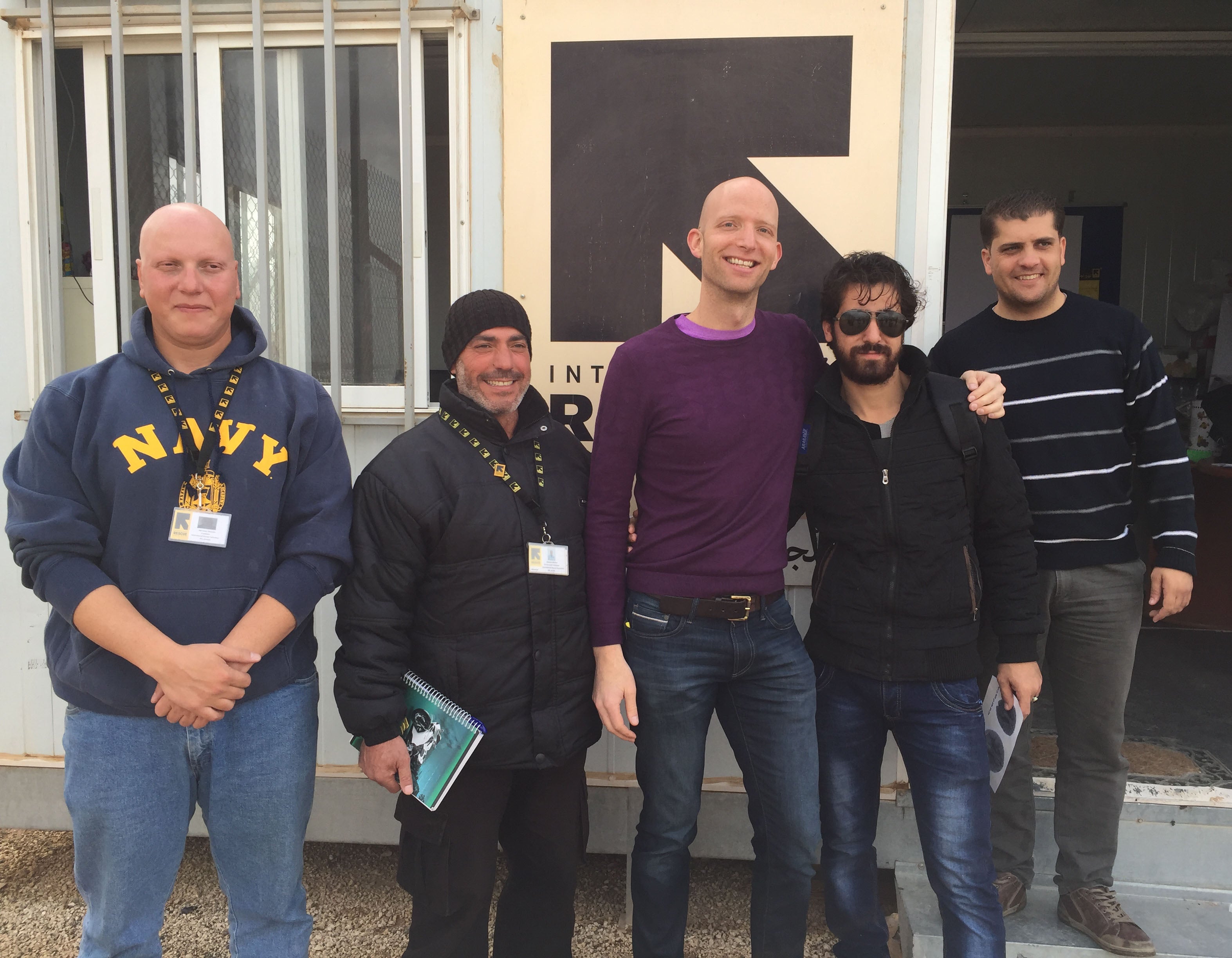 Austin Riggs with Jordanians and Syrians in Azraq refugee camp in Eastern Jordan