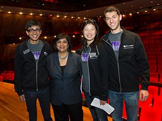 Students pose with Dean Geeta Menon