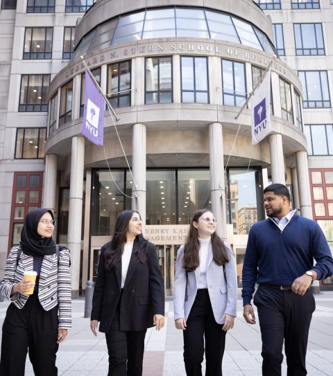 Students walk in front of Stern