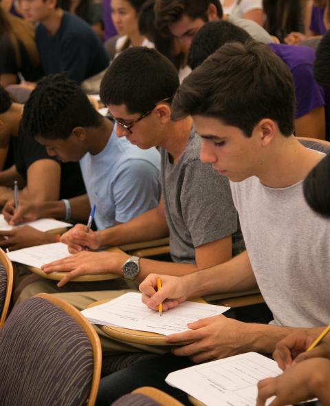 Students taking a test in class