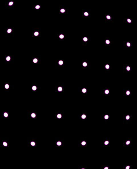 Dots of light in grid shape on black background