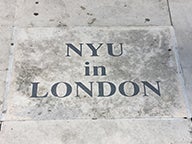 "NYU in London" written in stone