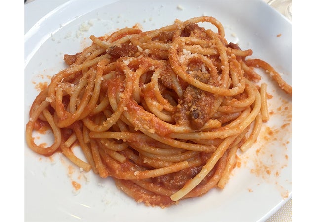 A close-up of a dish of amatriciana pasta served in Rome, Italy. 