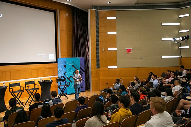 Professor Deepak Hegde addresses the crowd