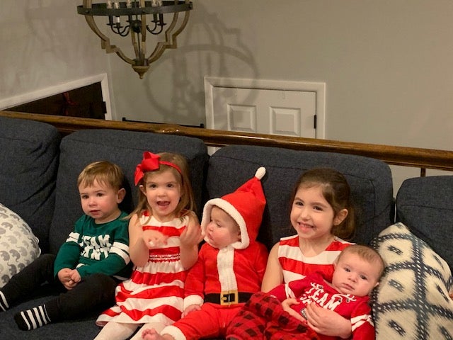 Bryan Ramos's family dressed in holiday outfits