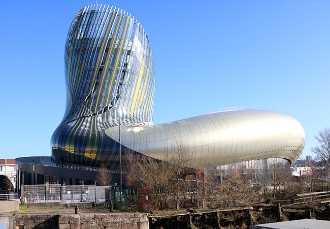 The abstract exterior design of La Cité du Vin, the world's largest wine museum. 