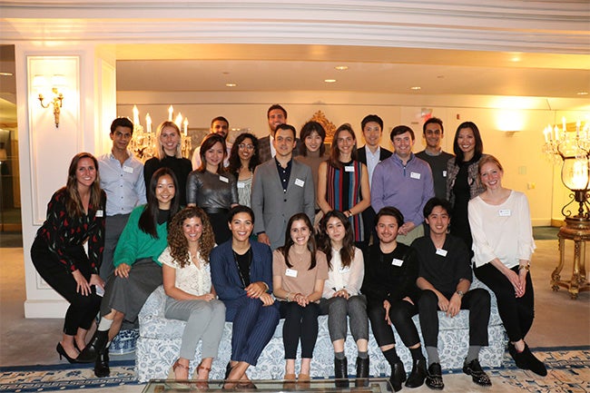 Fashion & Luxury MBA students pose at the Fashion & Luxury MBA Welcome Reception hosted at Estée Lauder Corporate Headquarters.