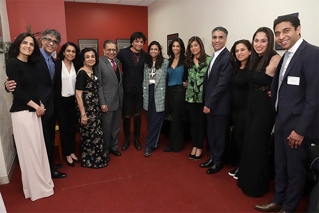 M. Night Shyamalan and members of the Sani family