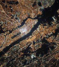 An aerial photo of Manhattan at night