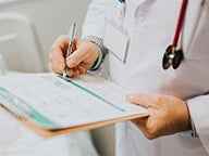 Doctor writing notes