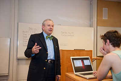 Professor Al Lieberman teaching to classroom of students