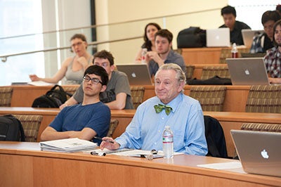 Professor Al Lieberman sitting in a classroom of BEMT students