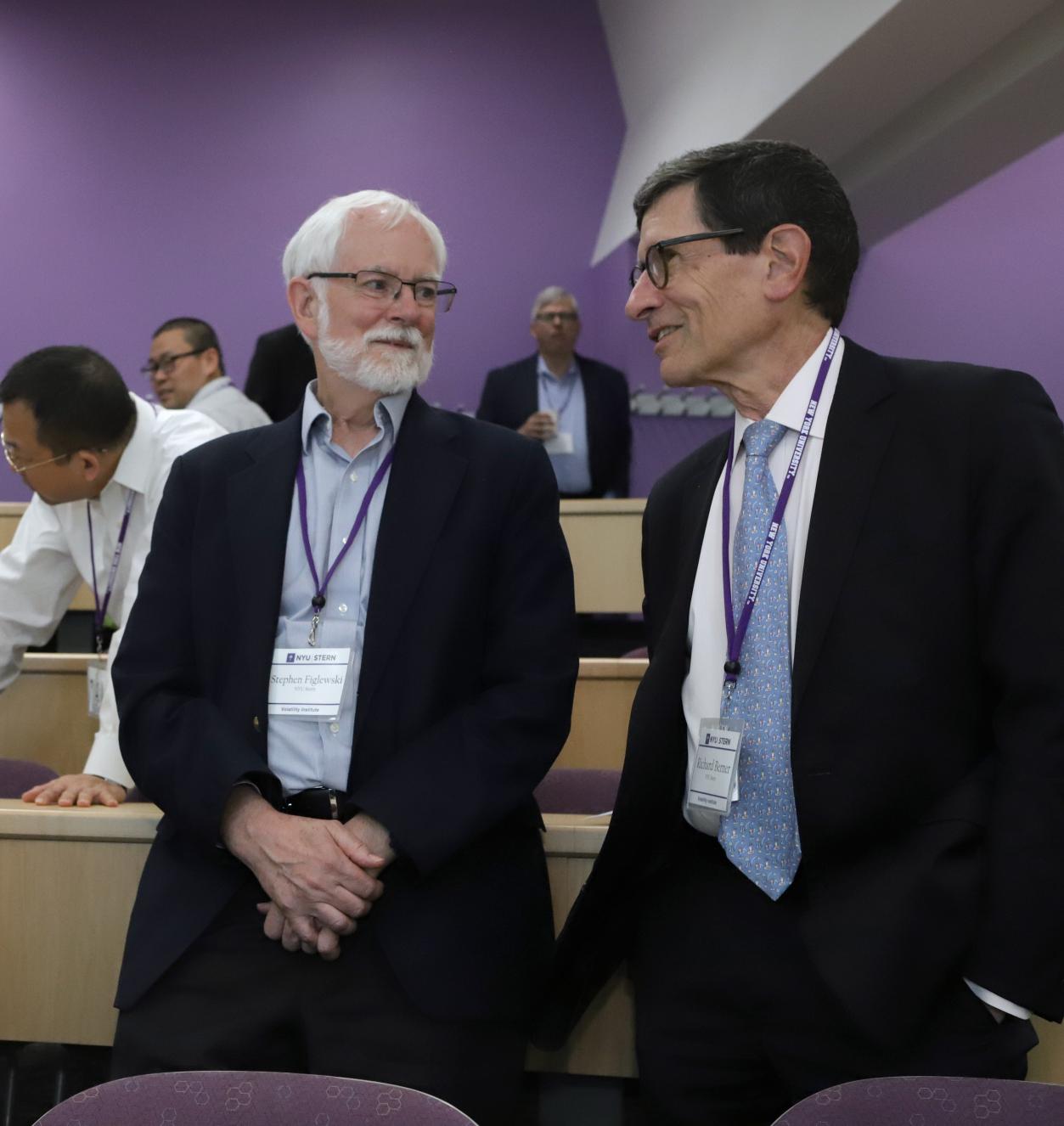 Attendees conversing at 2019 conference 2