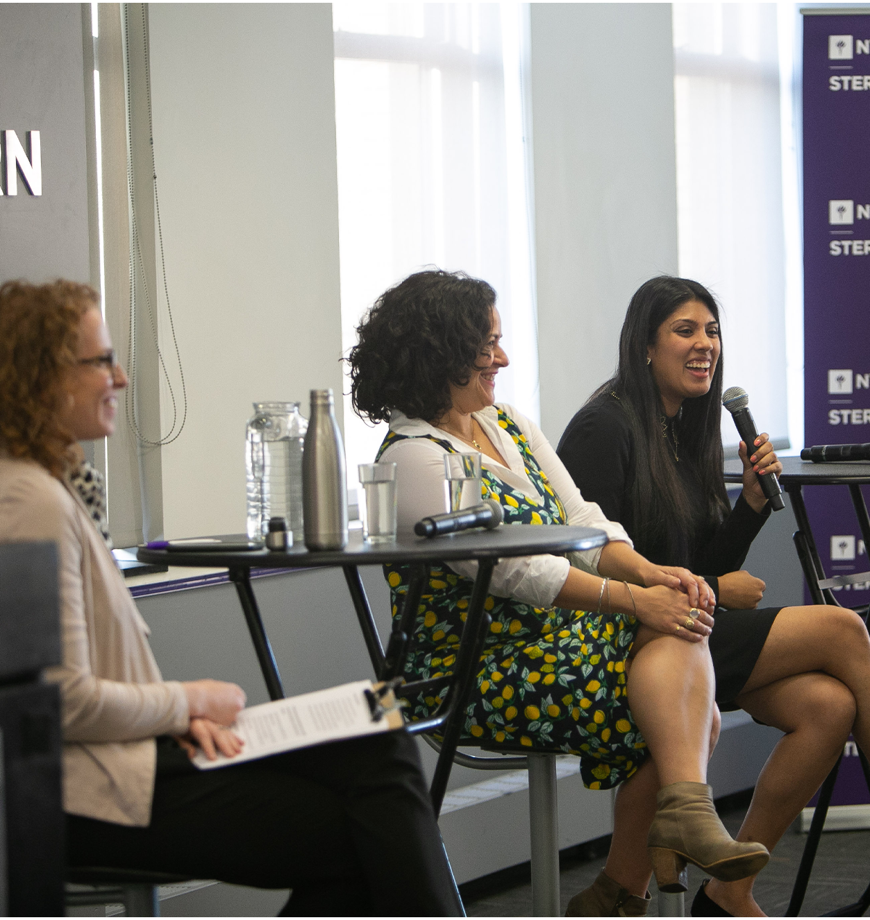 4 people during a panel discussion