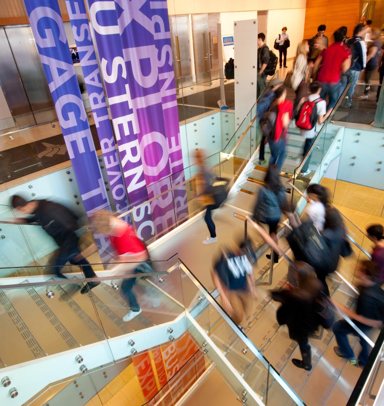 Students on the stairs of Tisch