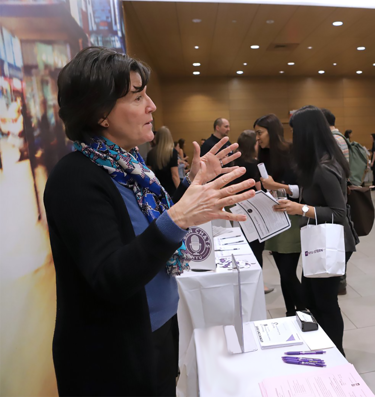 Eliza Shanley speaks with a Langone student at Langone LAB