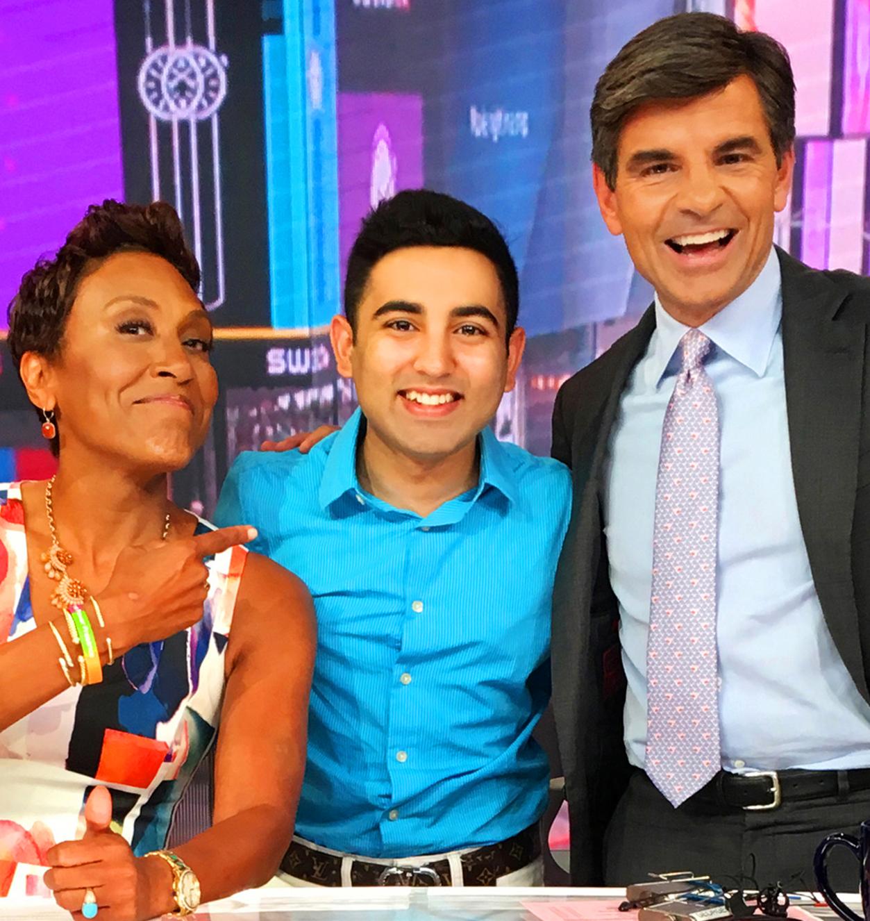 Student Shobhit Jain posing with Good Morning America co-hosts