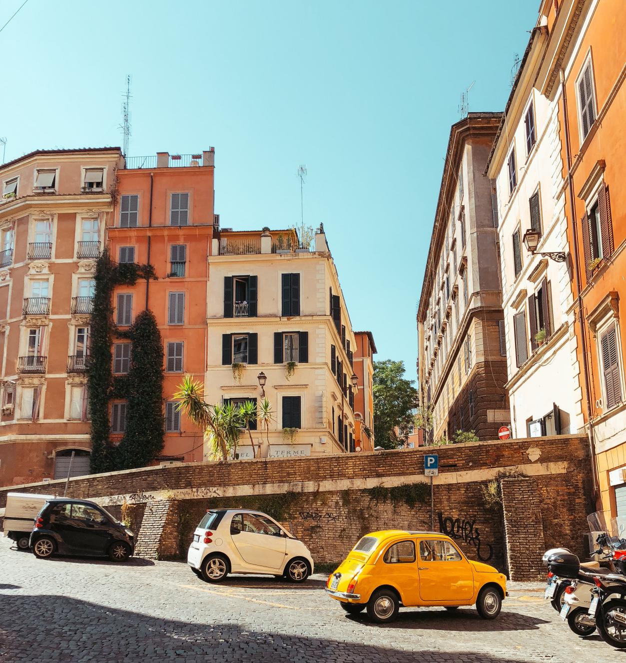 Photo of yellow mini cooper in Torino, Italy. 