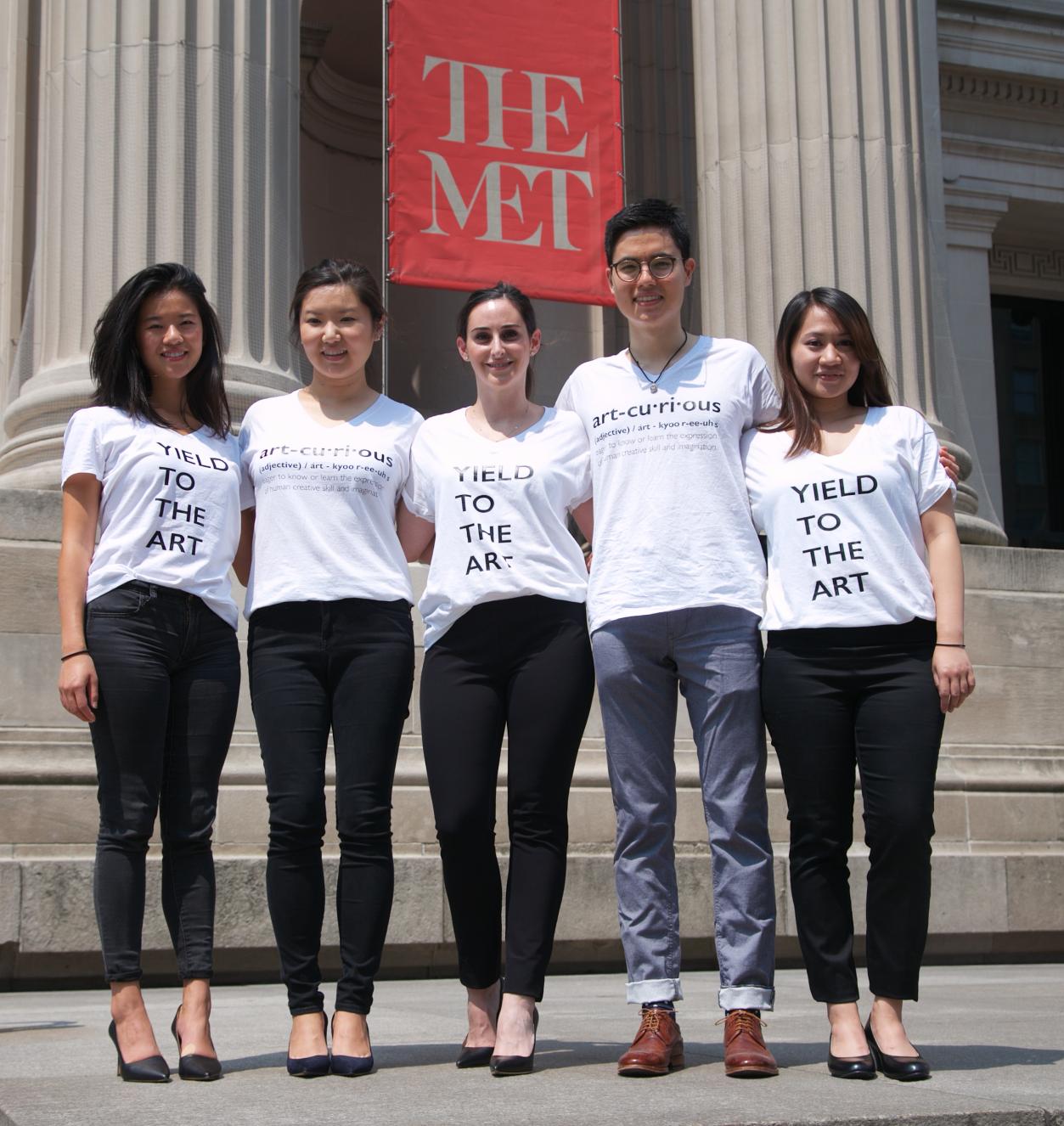 Five students standing in front of the Metropolitan Museum of Art