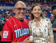 Caroline O’Connor (MBA ’08) poses with Emilio Estefan