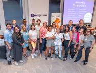 A group photo of alumni that showcased their businesses and products at Taste of Stern 2023.