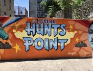Image of a mural on the wall of a building that says I live in Hunts Point