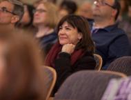 parent smiling during presentation