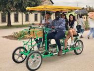 Study-Abroad Students in a Four-Person Bike