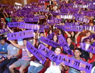 Students holding up " I am Stern" banners