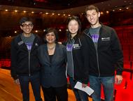 Students pose with Dean Geeta Menon