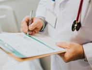 Doctor writing notes