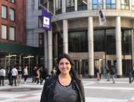 Rebecca Malz in front of the KMEC building