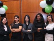 Five female Stern students at the USWIB Conference 
