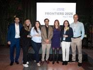 A group stands in front of a sign reading "Frontiers 2026" with the Endless Frontier Labs logo