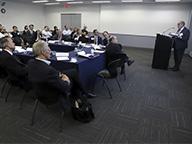 Joshua Ronen speaks to roundtable attendees