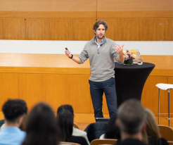 Professor Adam Alter leading an alumni workshop