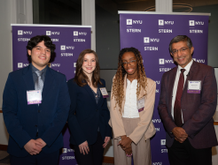 From left: Jesús Gomez (BS/MS ’27), Renee Bogda (MBA ’26), and Nicole Stallings (BS ’26) along with Dean Bharat Anand