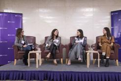 Four women talking together on panel at Stern 