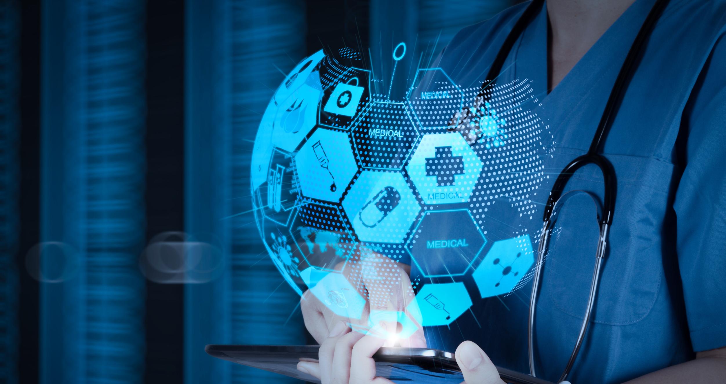 A doctor holding a tablet.