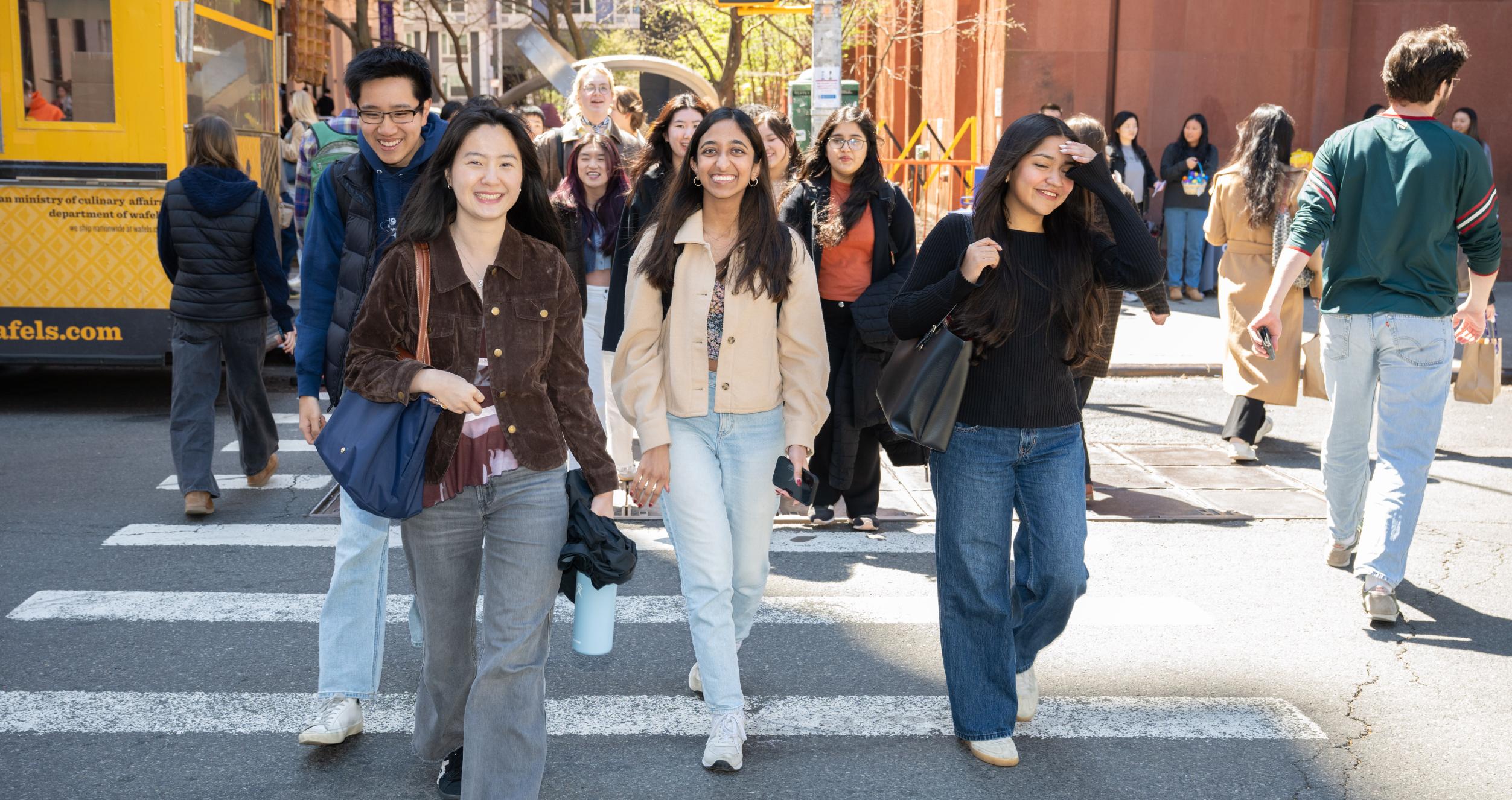 Students crossing West 4th Street