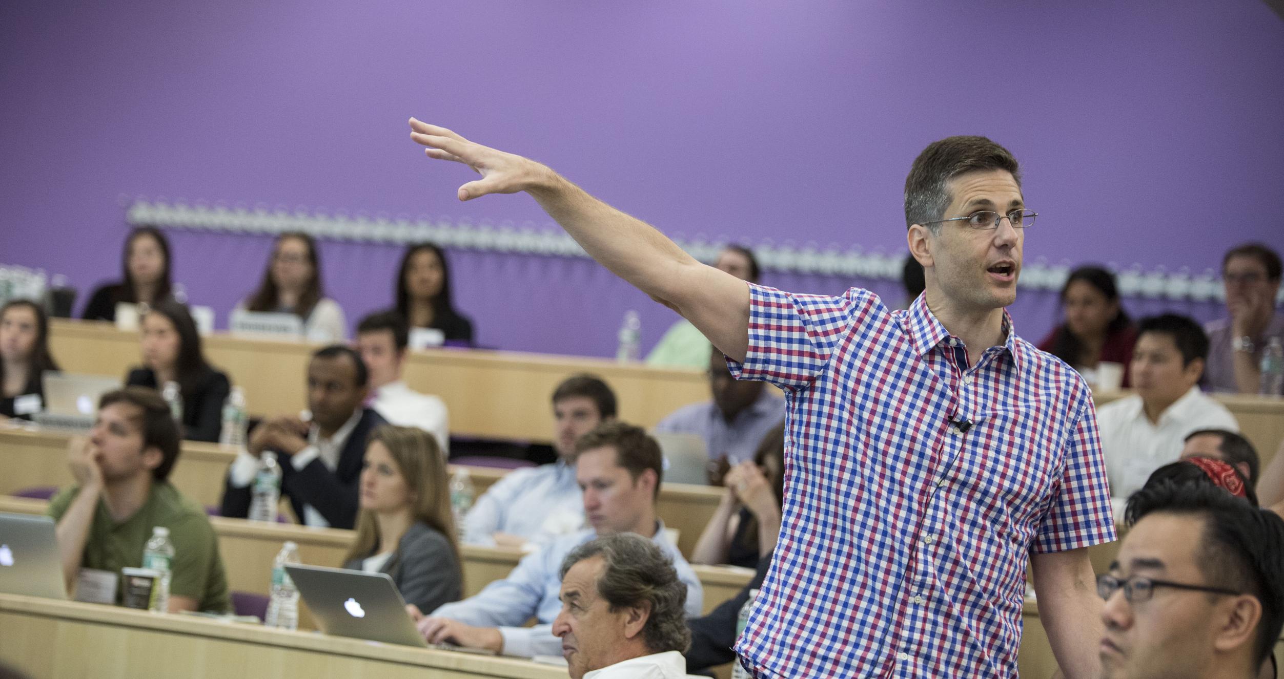 JP Eggers, Dean of MBA Programs, lectures in a classroom