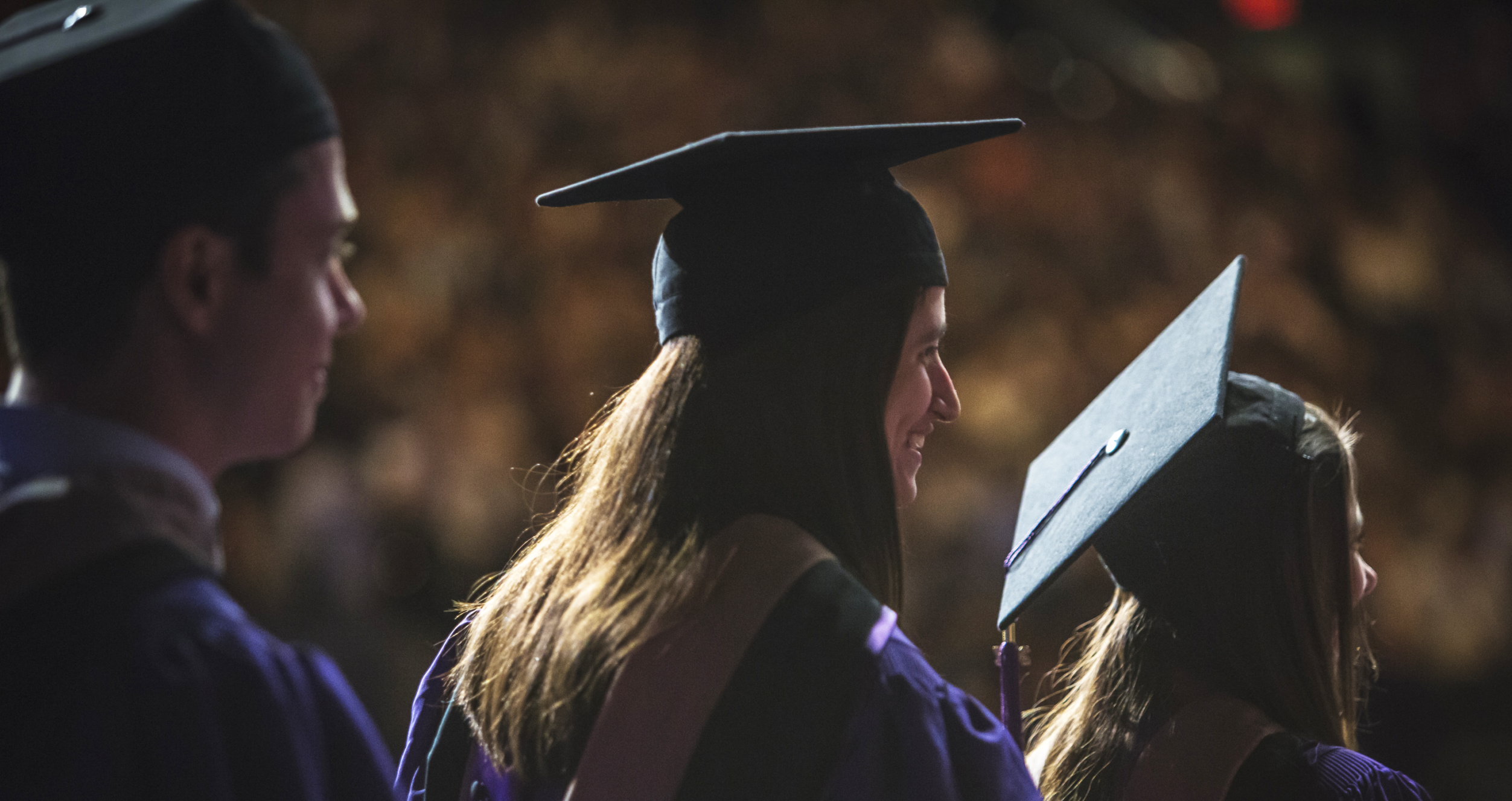 Grads walk across the stage at MSG