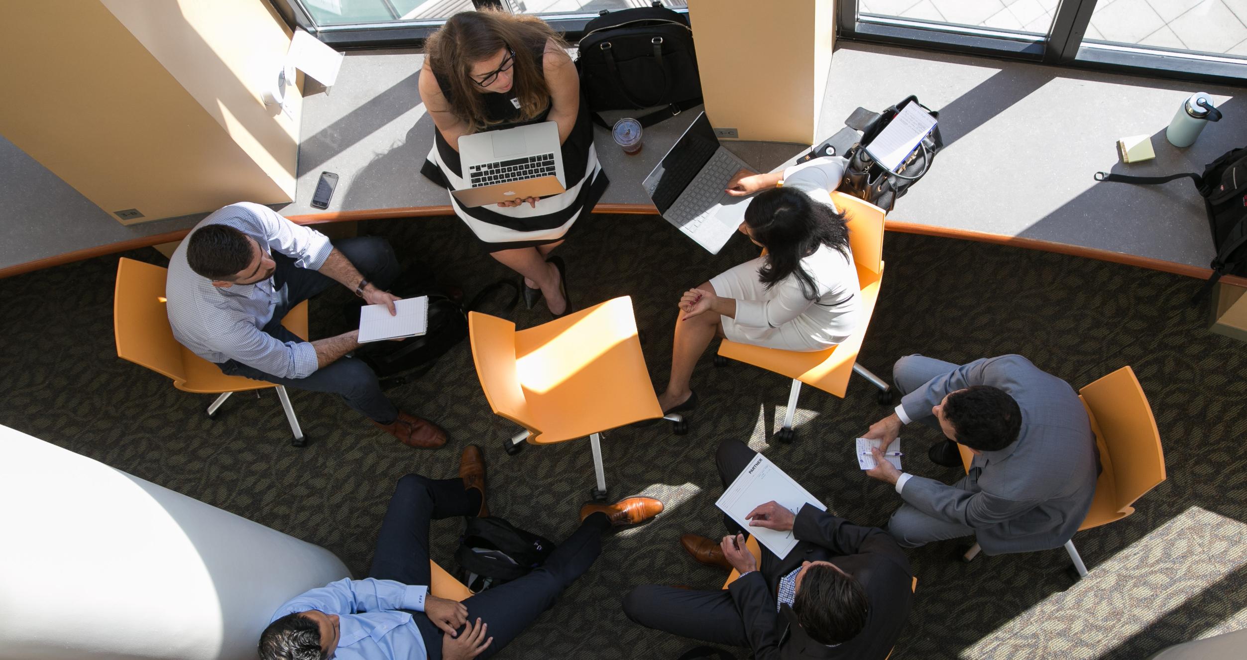 Photo from above of six students working