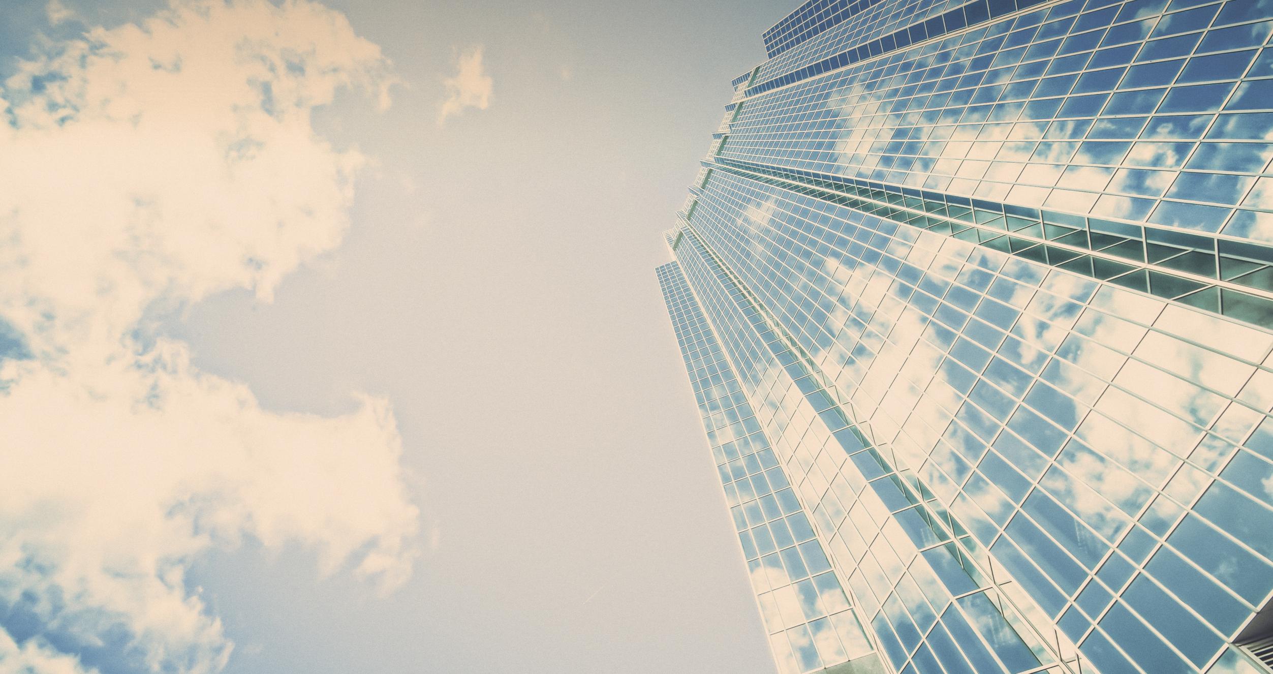 Skyscraper reflecting clouds