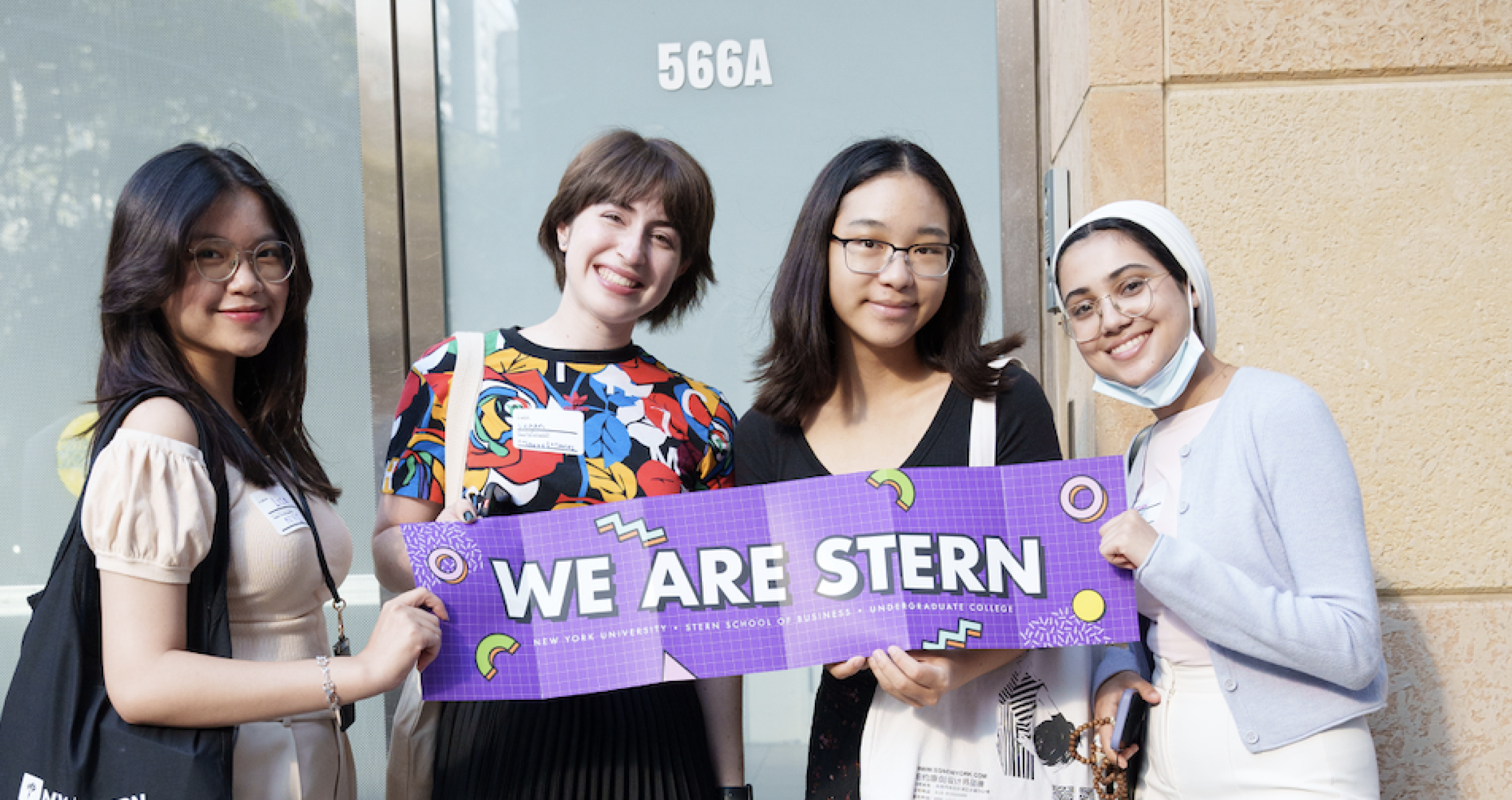 Students holding "We Are Stern" banner