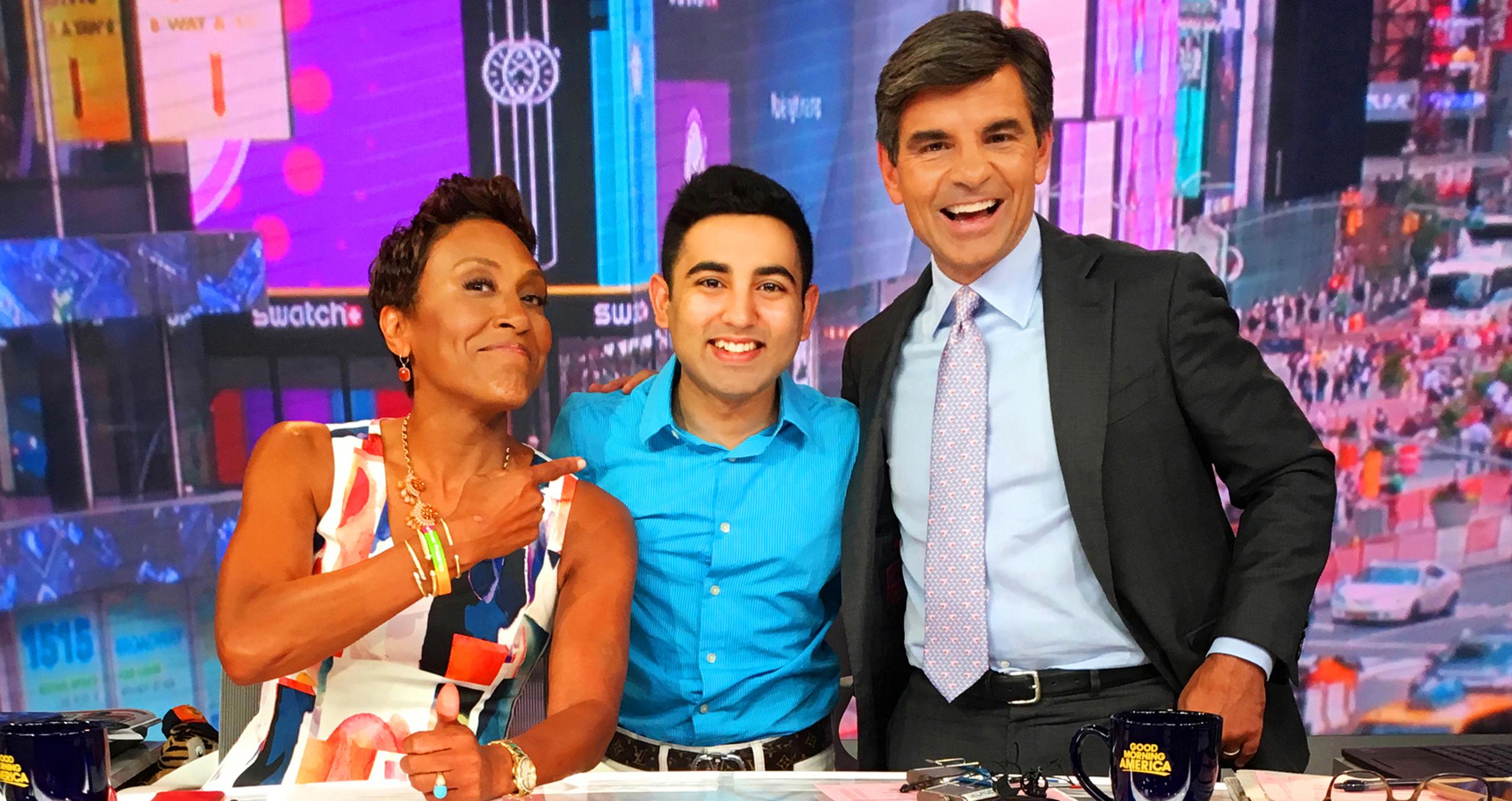 Student Shobhit Jain posing with Good Morning America co-hosts