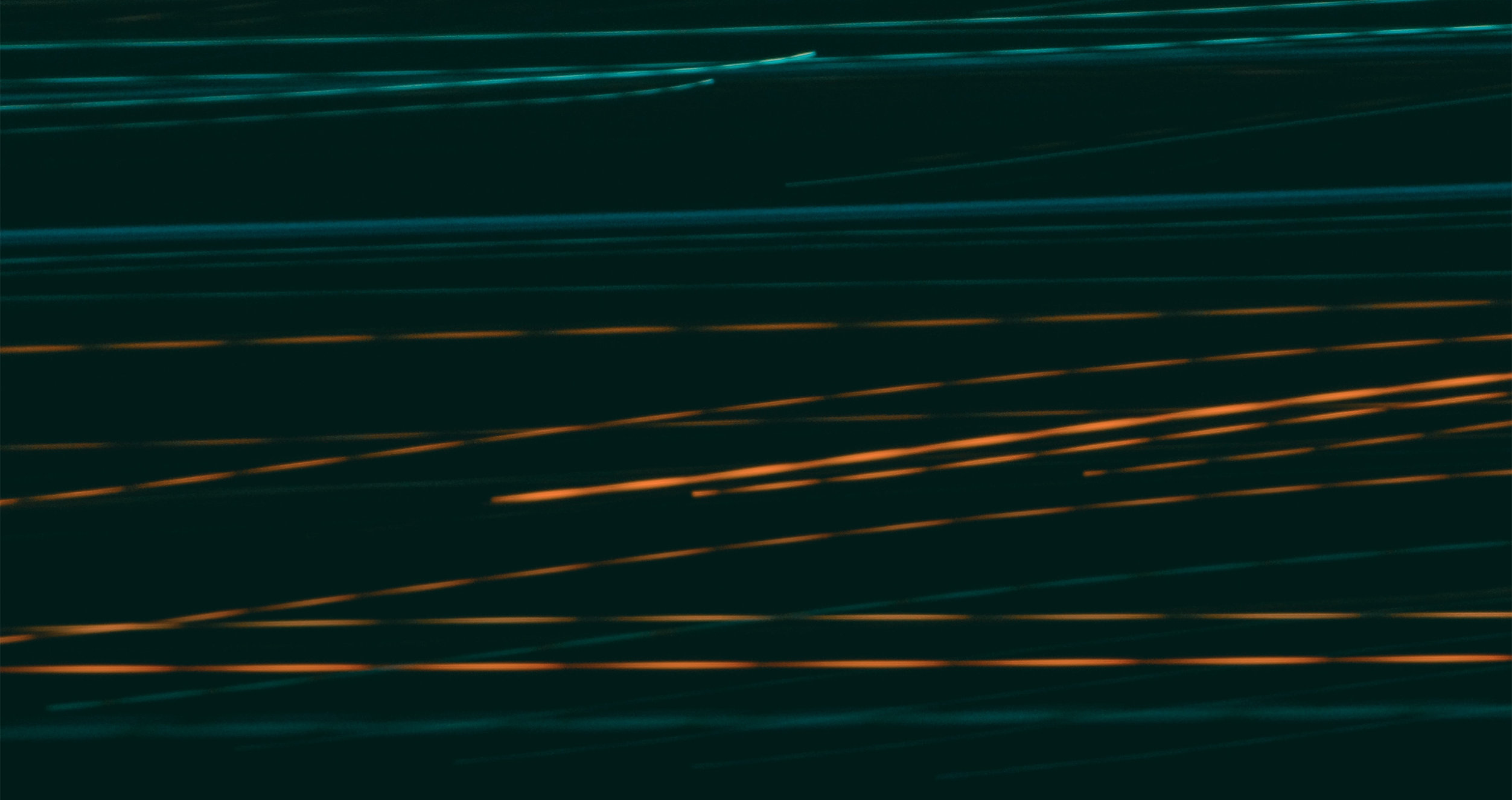 abstract green and orange light trails